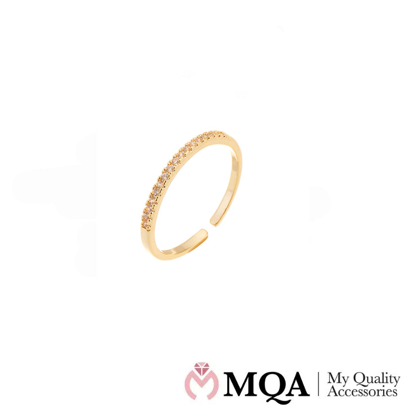 Ring, goldfarben mit einer Reihe schöner Steine