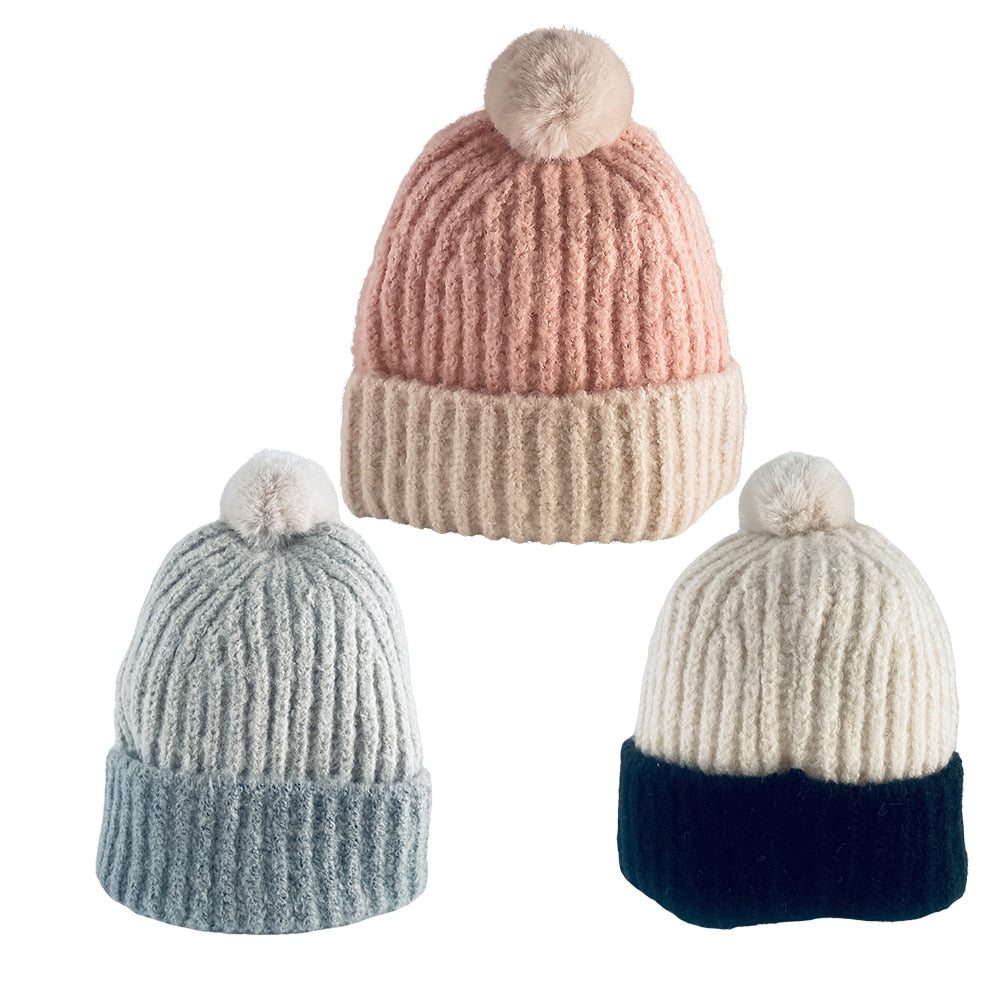 Trendige Strickmütze mit Quaste und umschlagbarem Rand